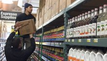 Houston's Merchandisers stock shelves and storing back-stock.