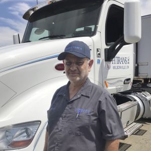 Aksel Dirkzwager next to his truck