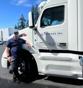 Tyler Cushman next to his truck